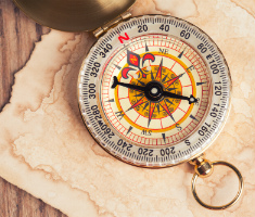 Image of a compass on a map